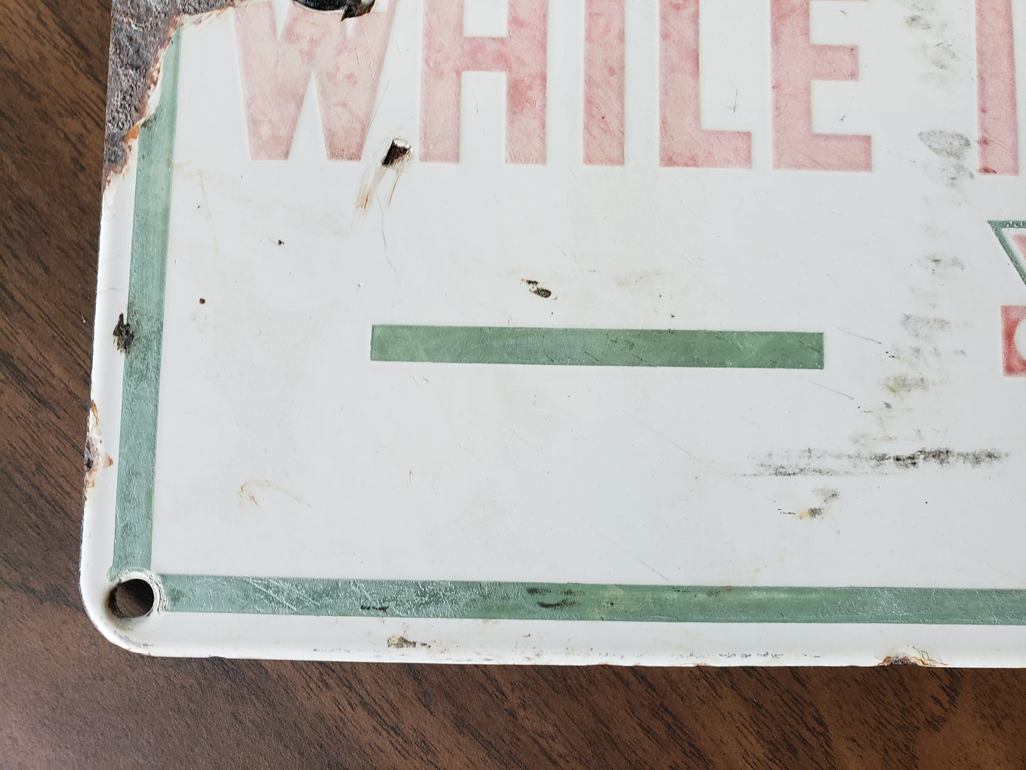 Conoco Do Not Oil While In Motion porcelain sign