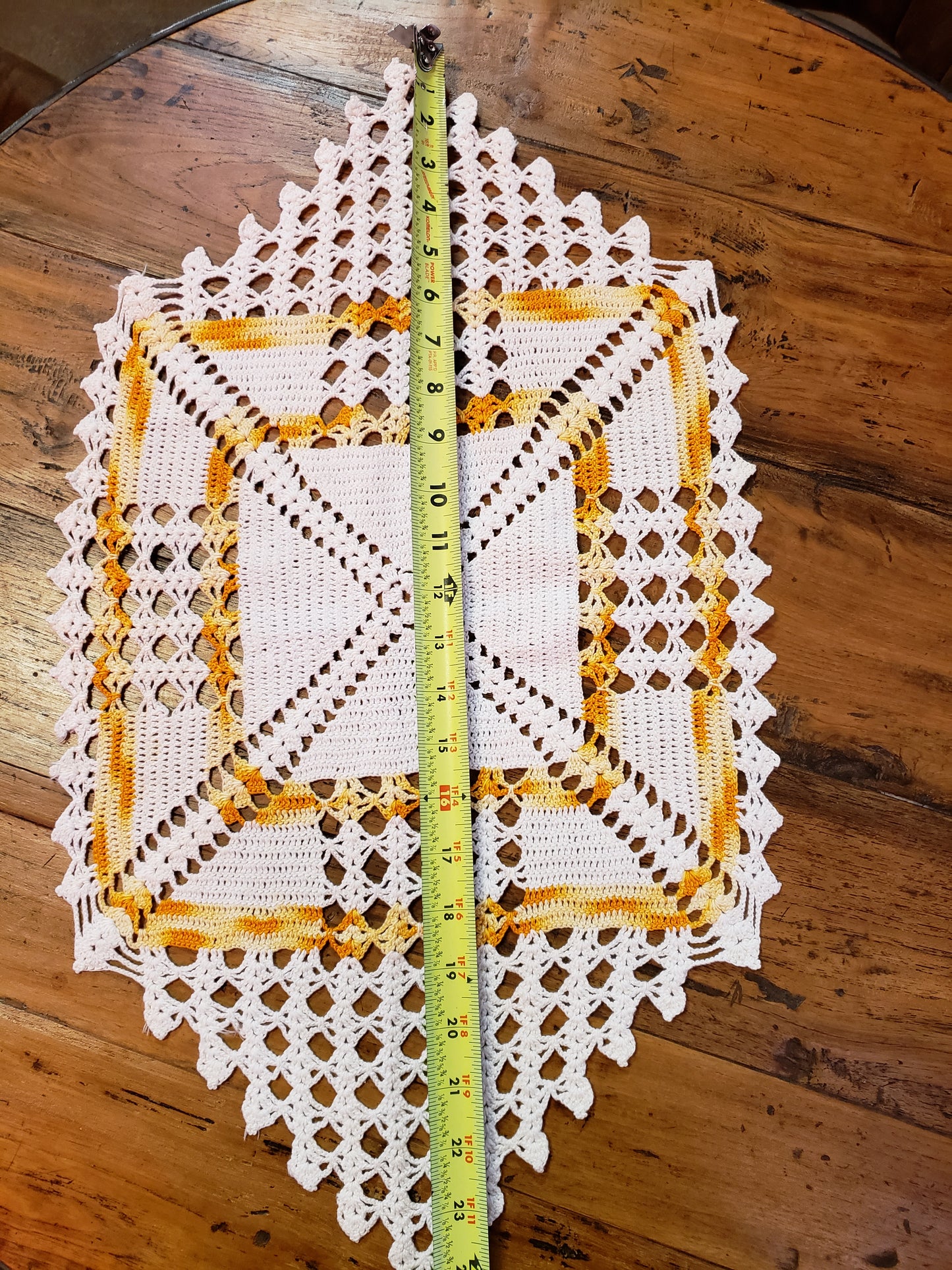 White and Yellow Orange Variegated doily