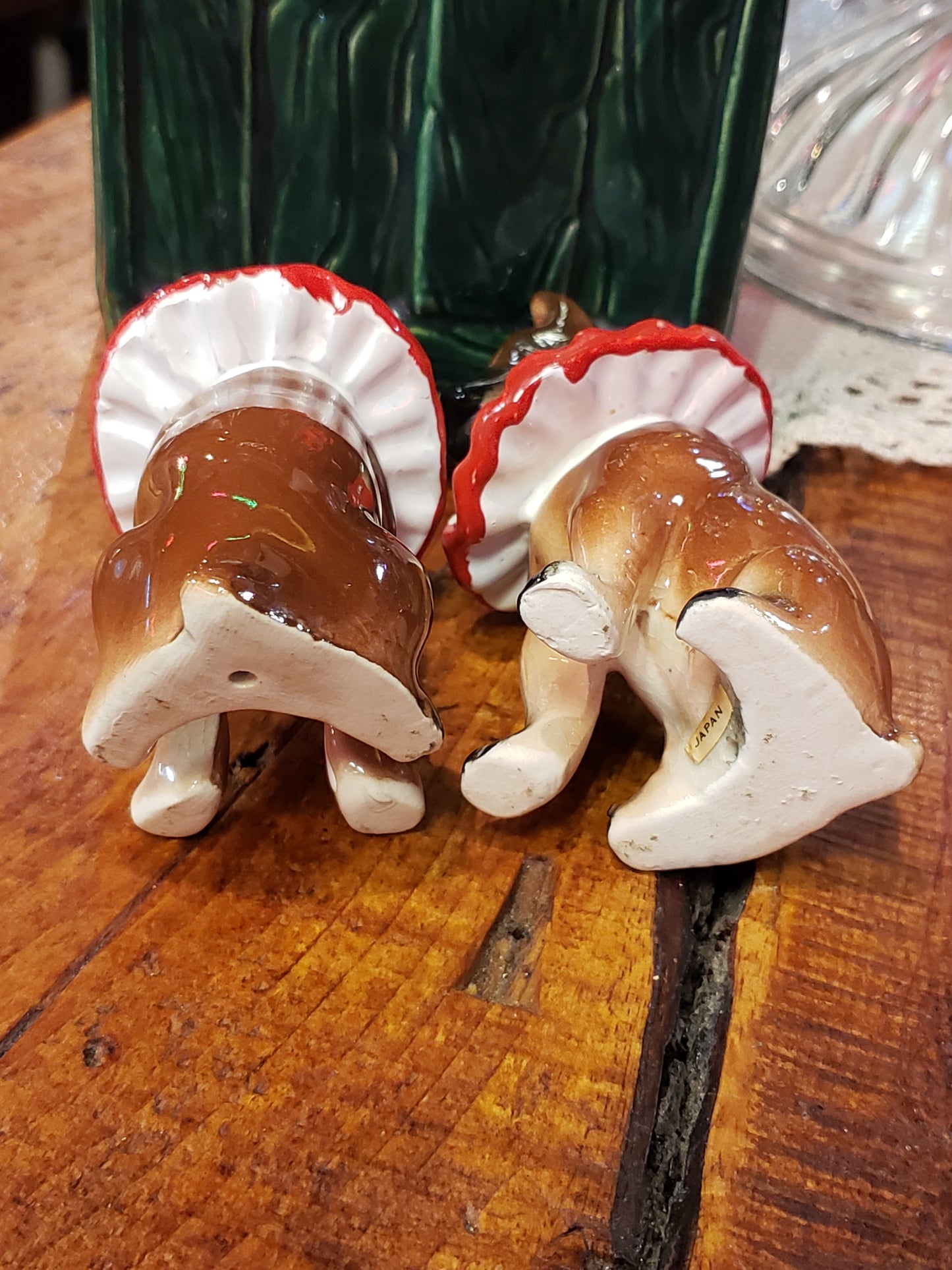Pair of Boxer Dog figurines with frilled collars