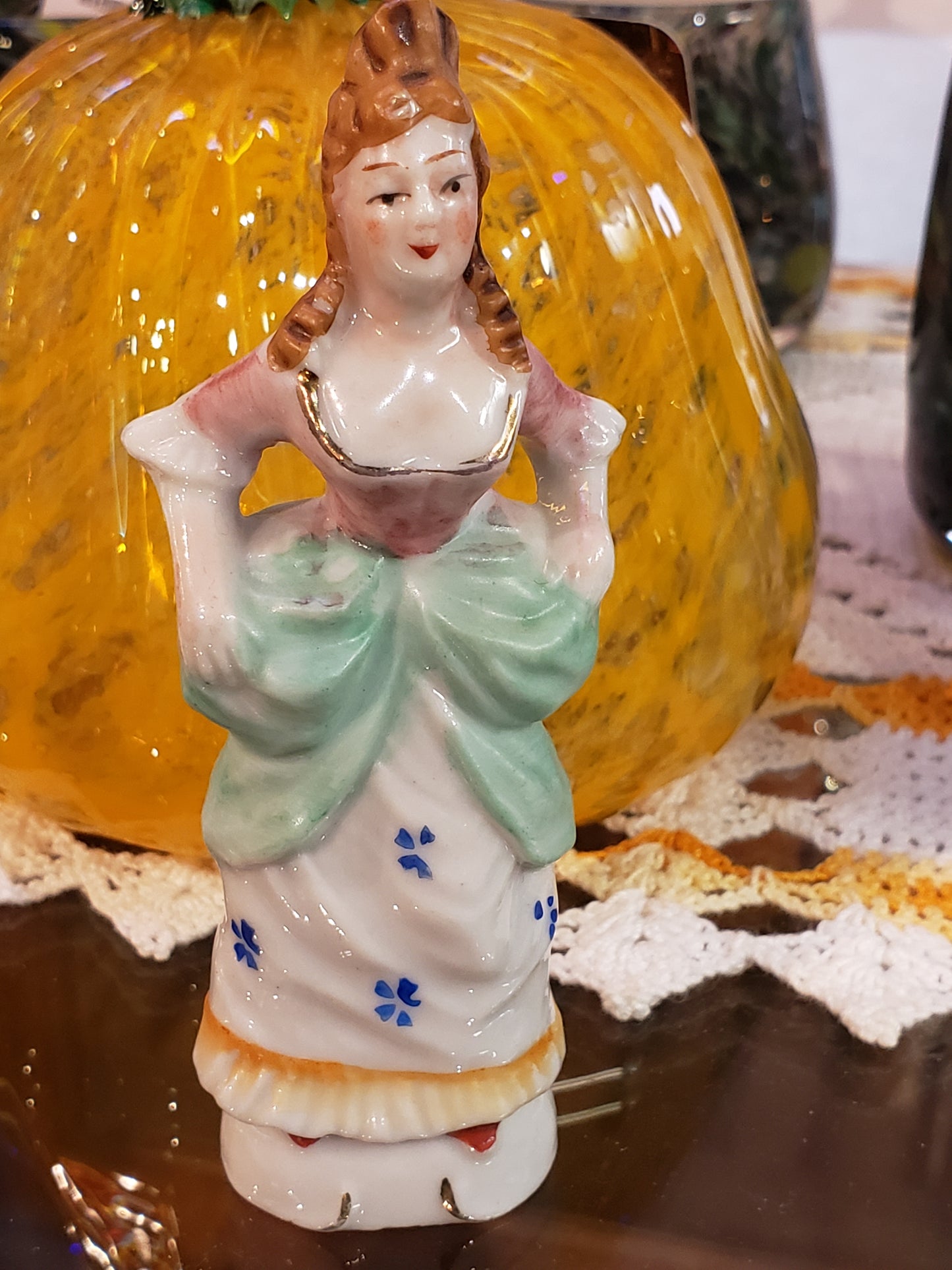 Buxom victorian lady figurine