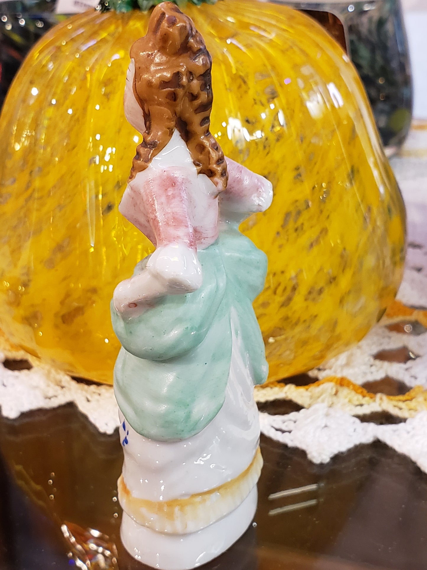 Buxom victorian lady figurine
