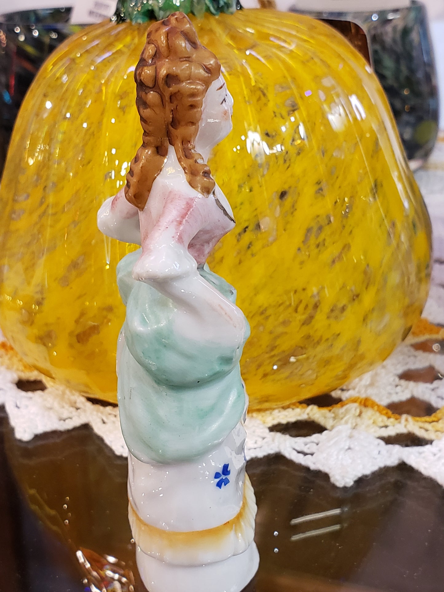 Buxom victorian lady figurine