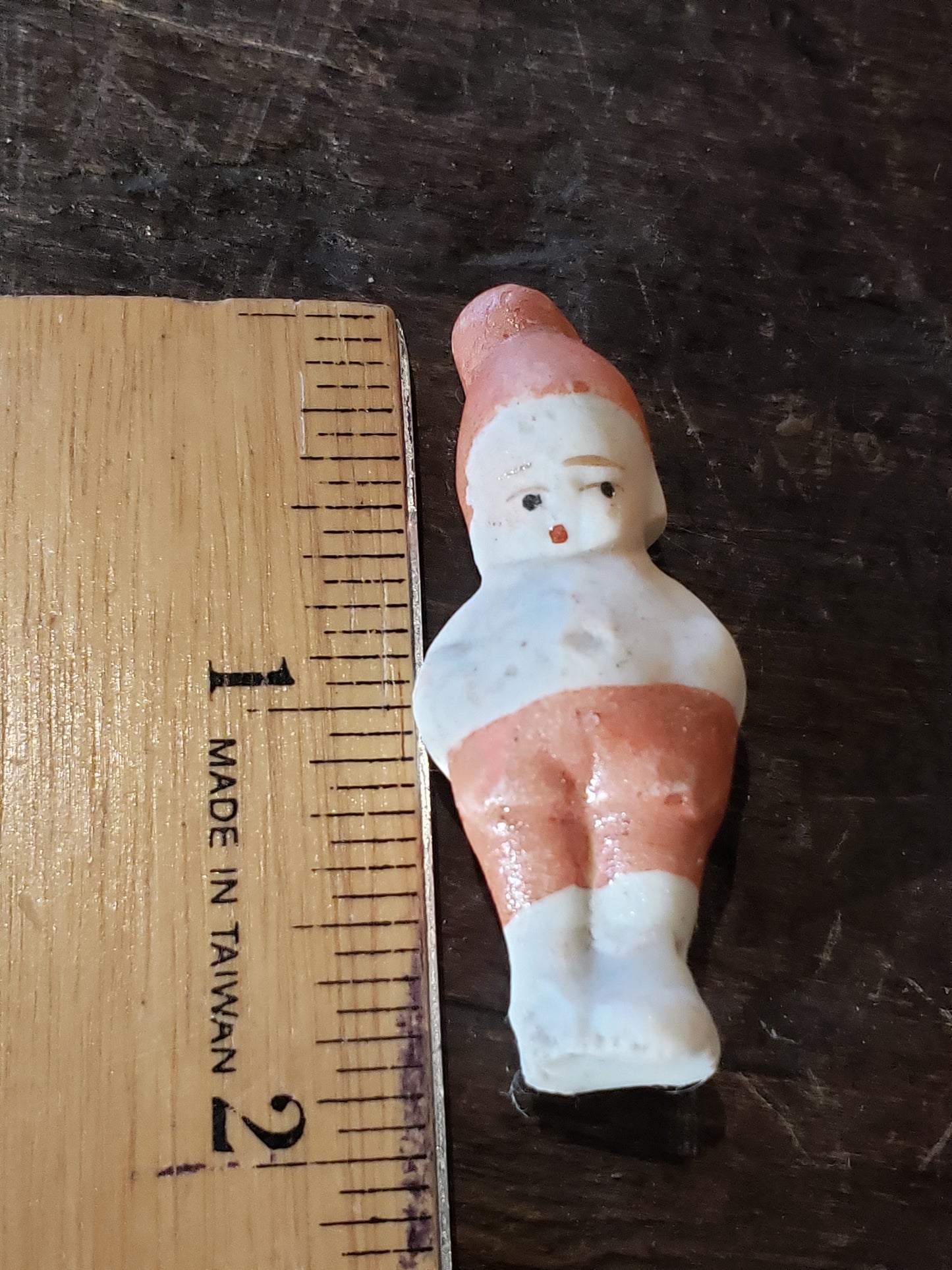 Tiny bisque doll