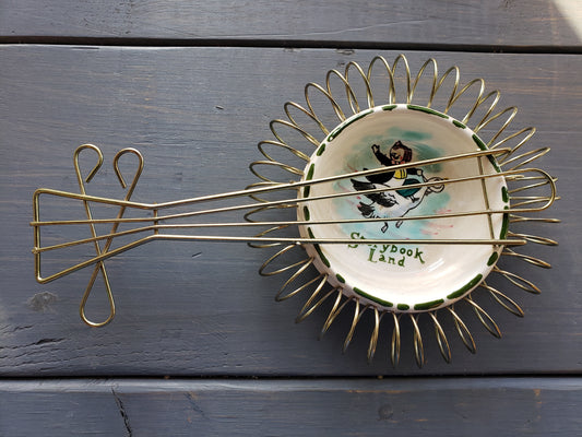 Storybook Land plate in metal guitar frame