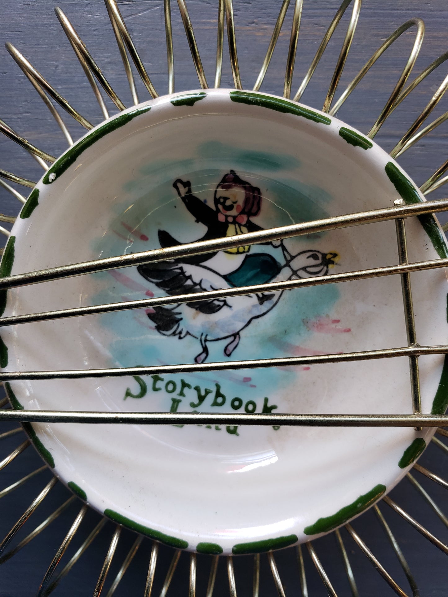 Storybook Land plate in metal guitar frame