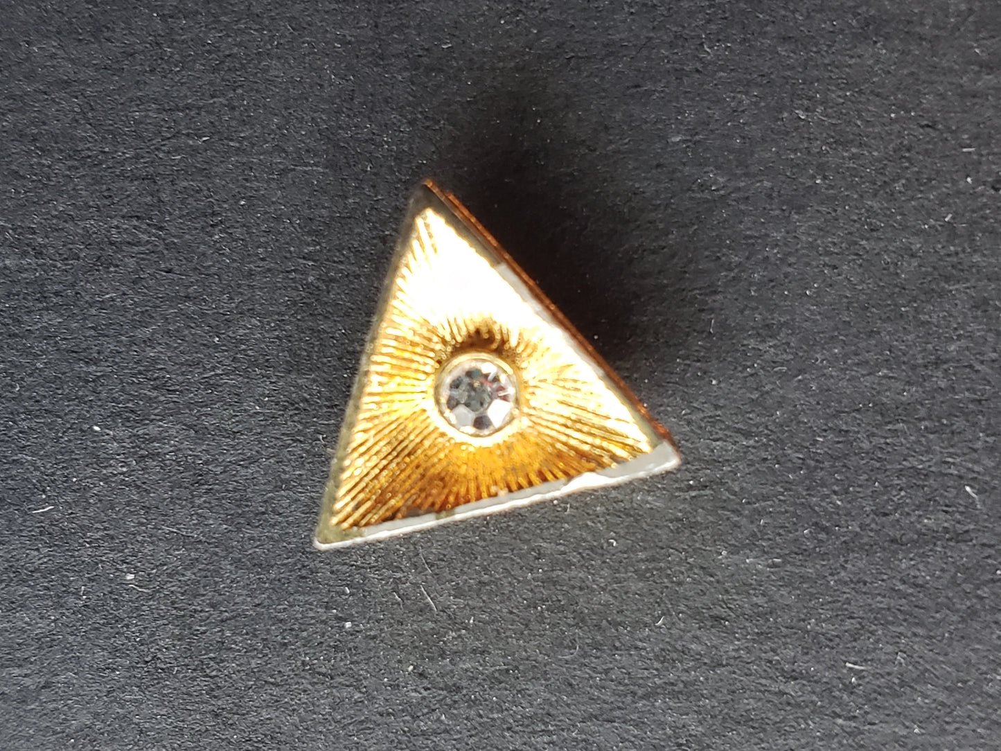 Triangle shaped tie tack with rhinestone