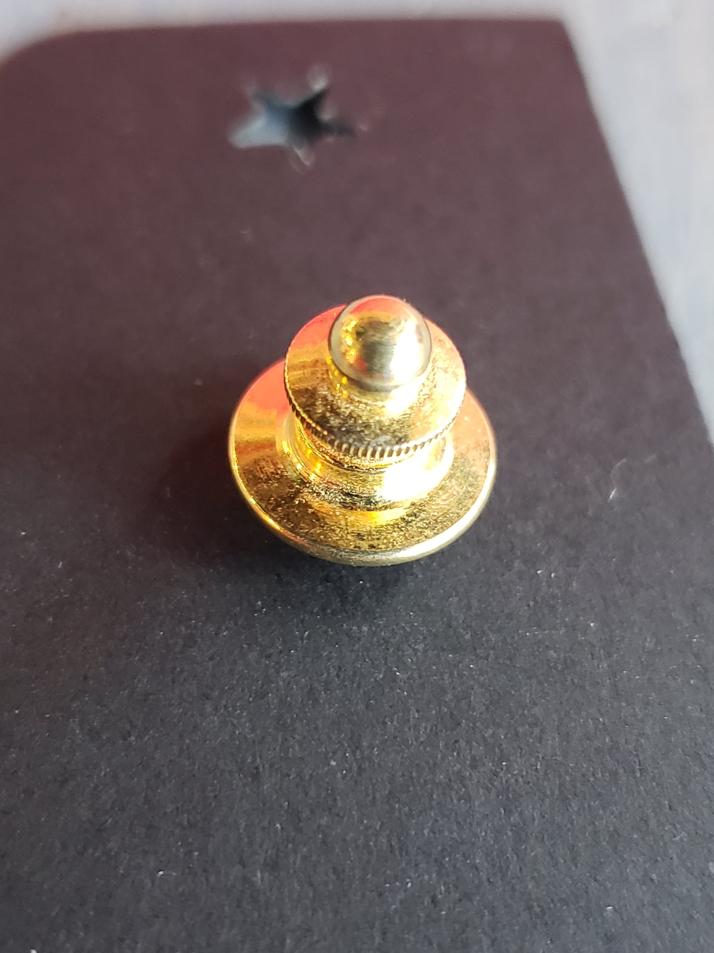 Triangle shaped tie tack with rhinestone