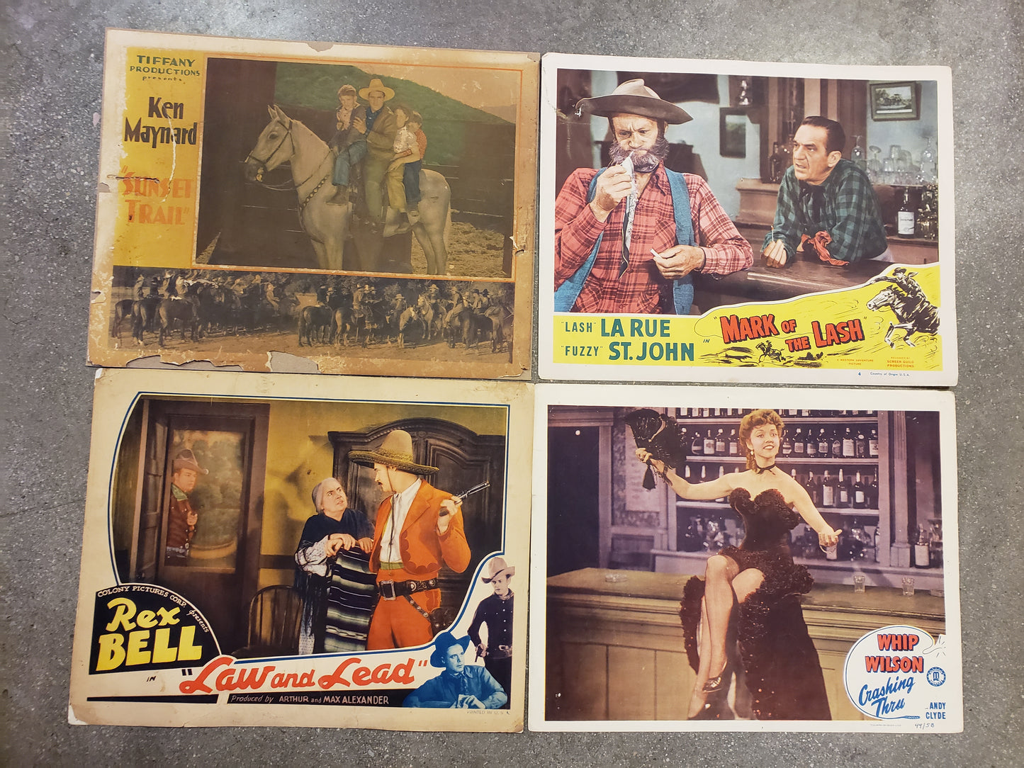 Set of 4 Vintage Western Movie Lobby Cards (Ken Maynard, Rex Bell, Whip Wilson, and Lash La Rue)