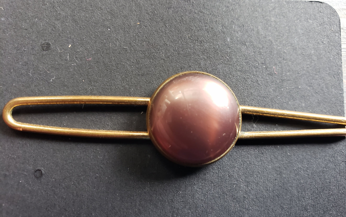 Brass and purple stone tie clip