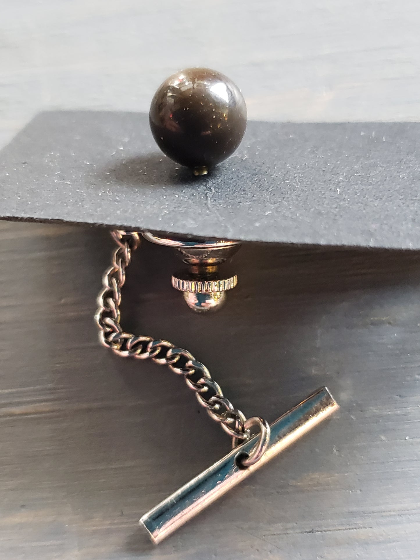 Round polished stone tie tack