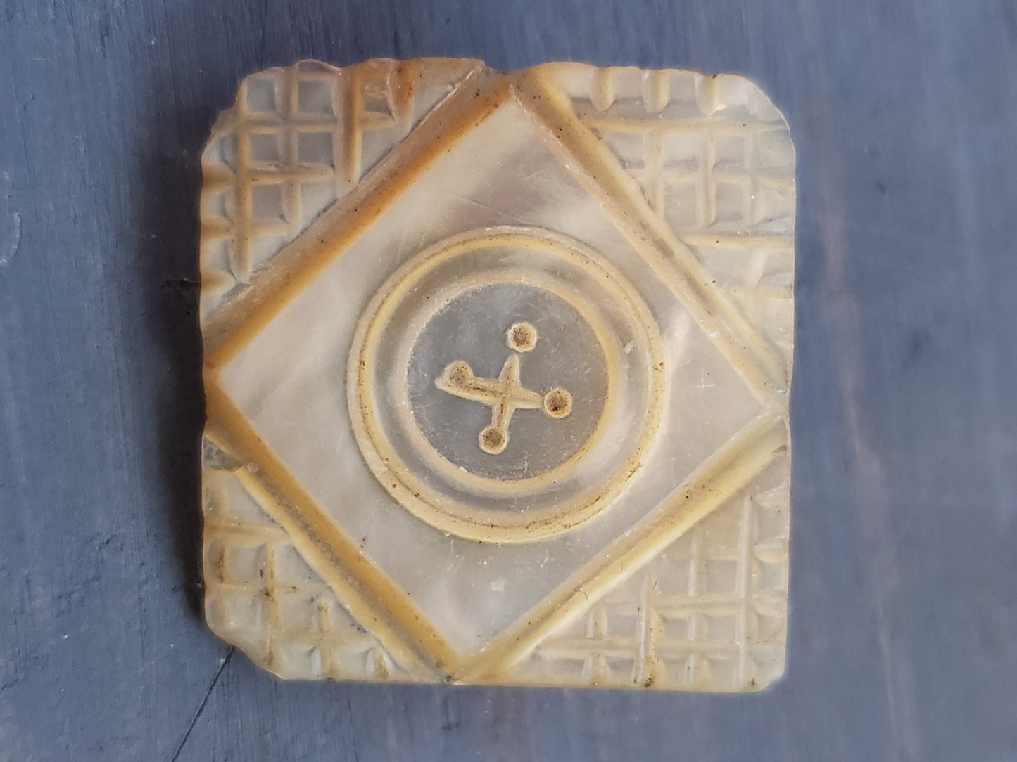 Very old mother of pearl lapel pin