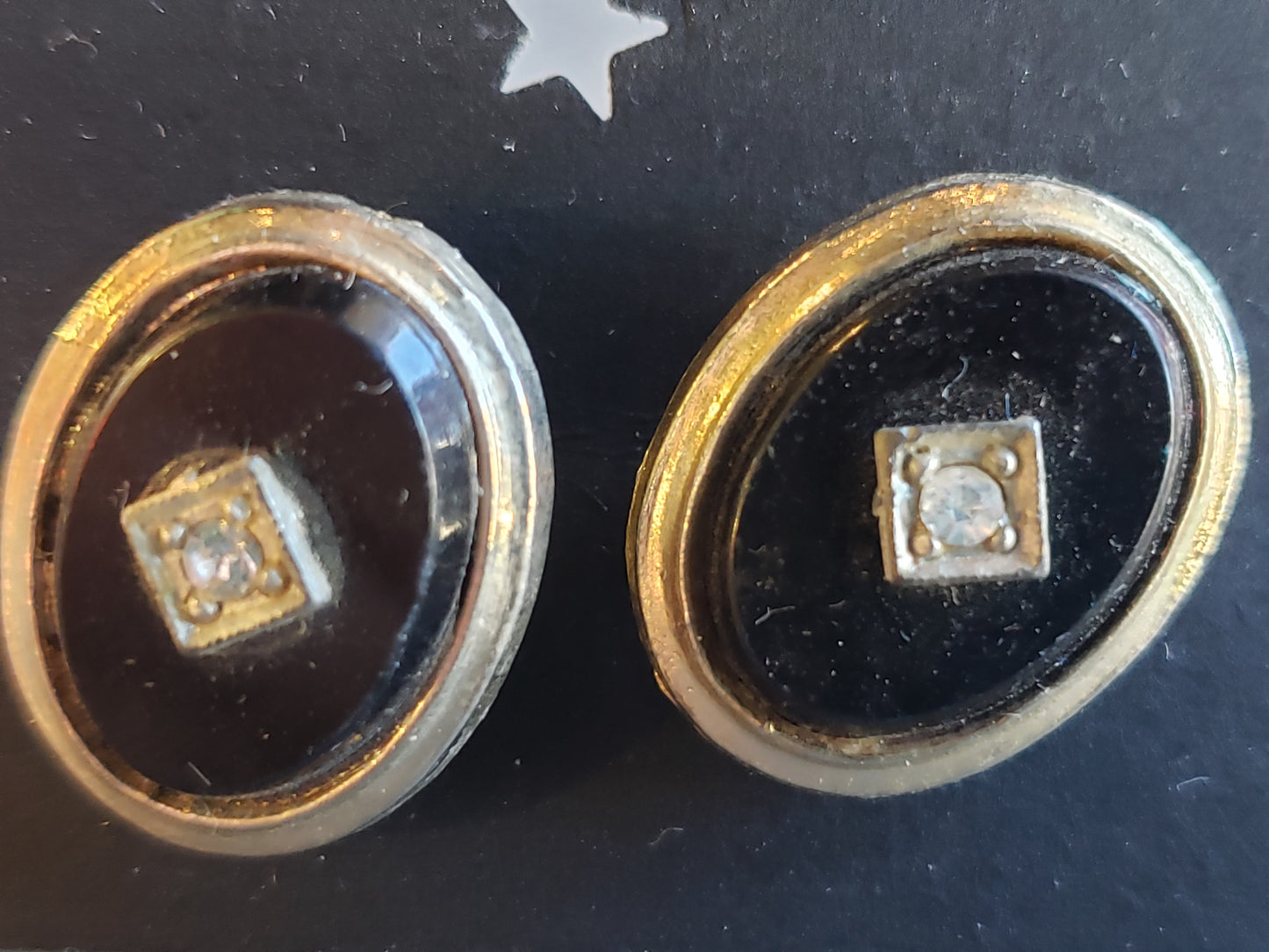 Black oval cuff links with rhinestones