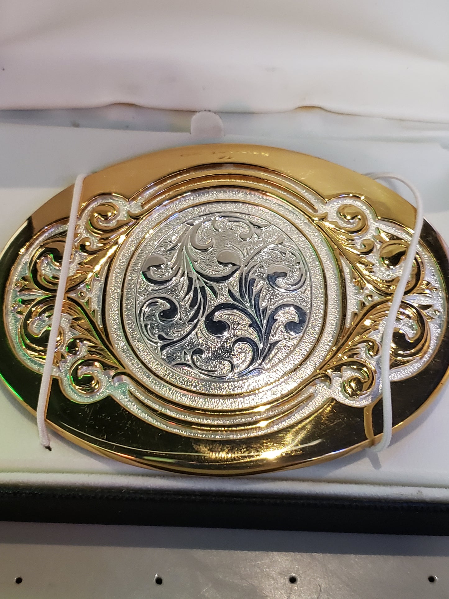 OC Tanner solid brass belt buckle