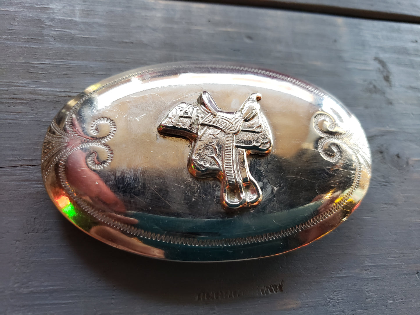 Saddle belt buckle