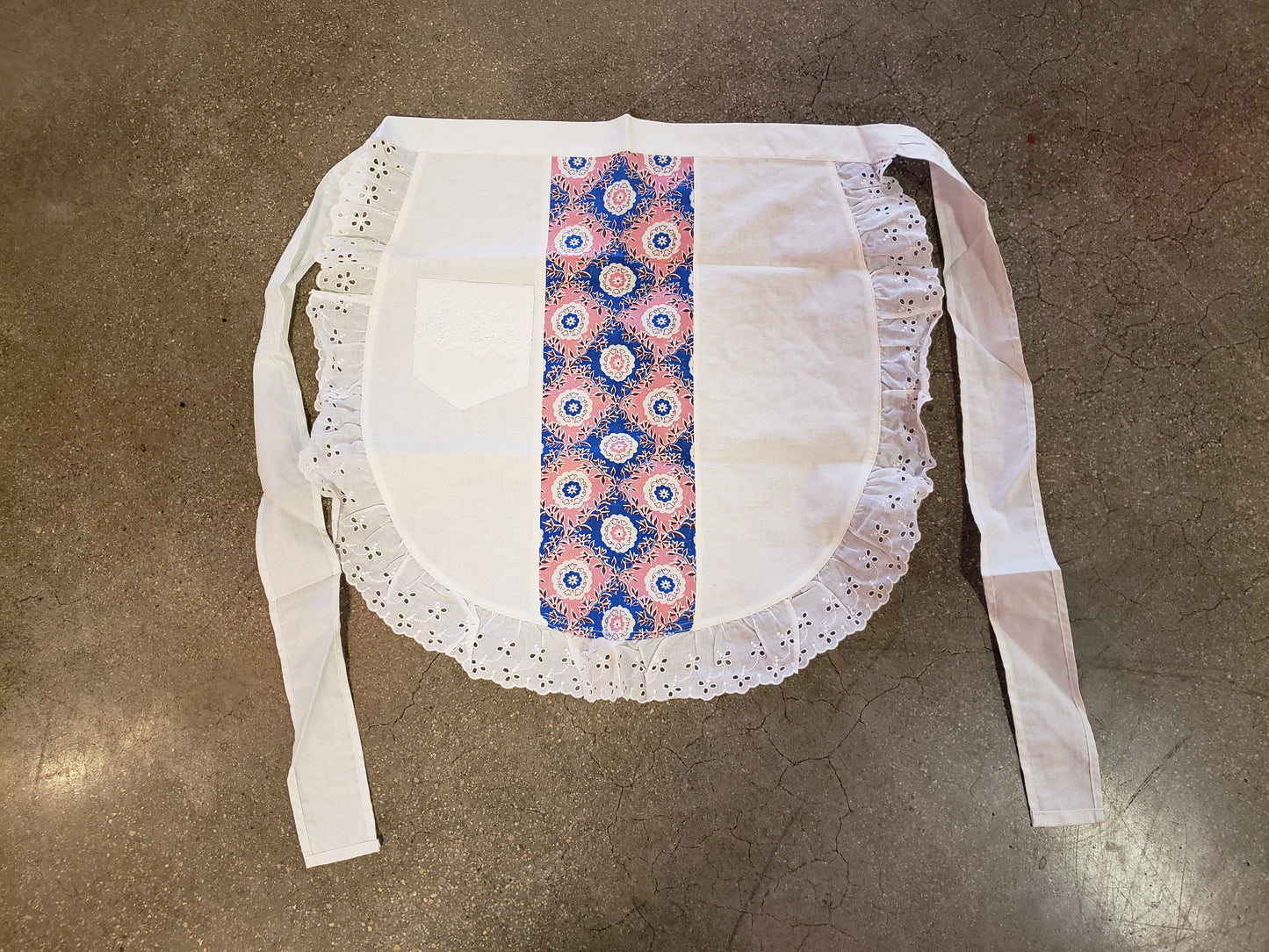 White pink blue vintage apron with eyelet trim