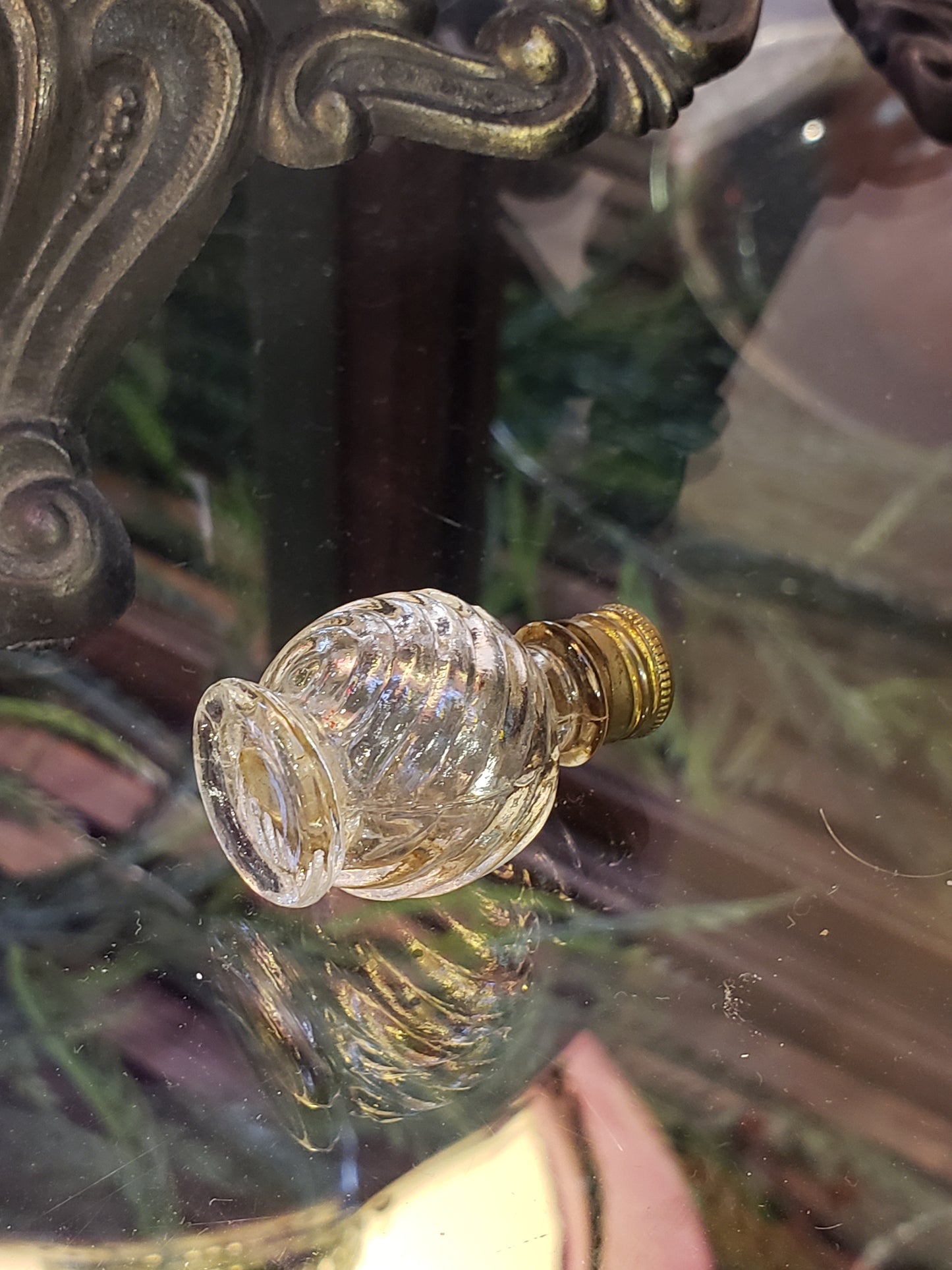 Tiny glass perfume bottle