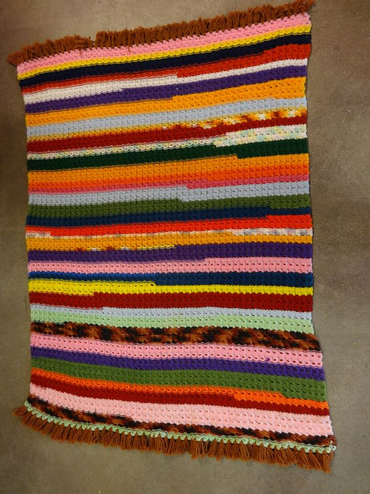 Multi colored handmade striped afghan