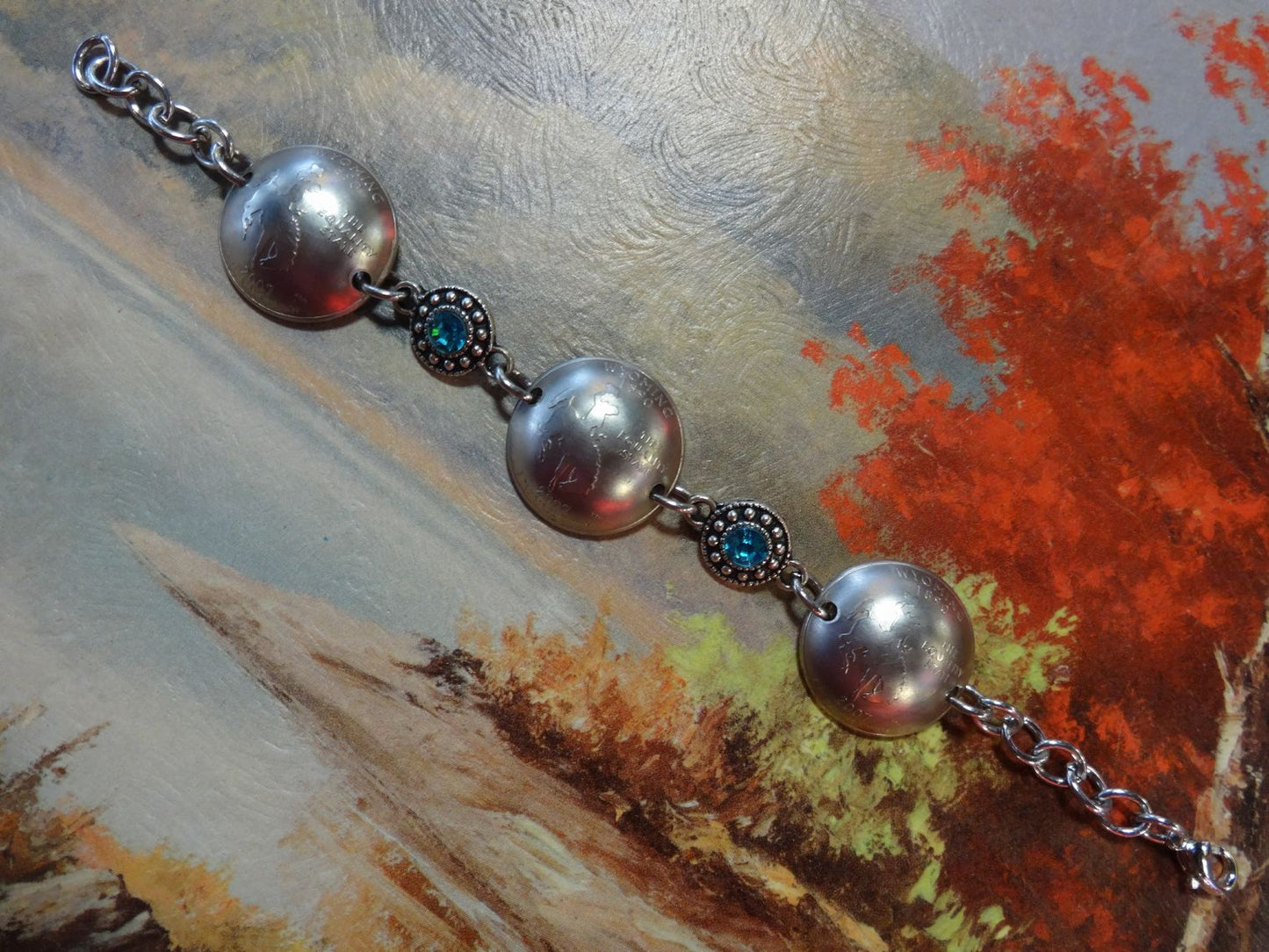Bracelet with 3 Wyoming Quarters and two light blue and silvertone beads