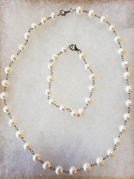 Authentic Pearl Necklace and bracelet set with Sterling links and clasp