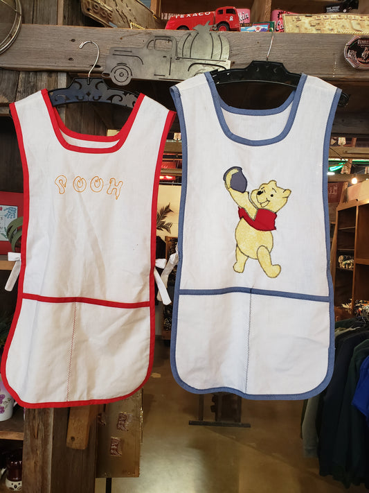 Set of two POOH child's vintage aprons