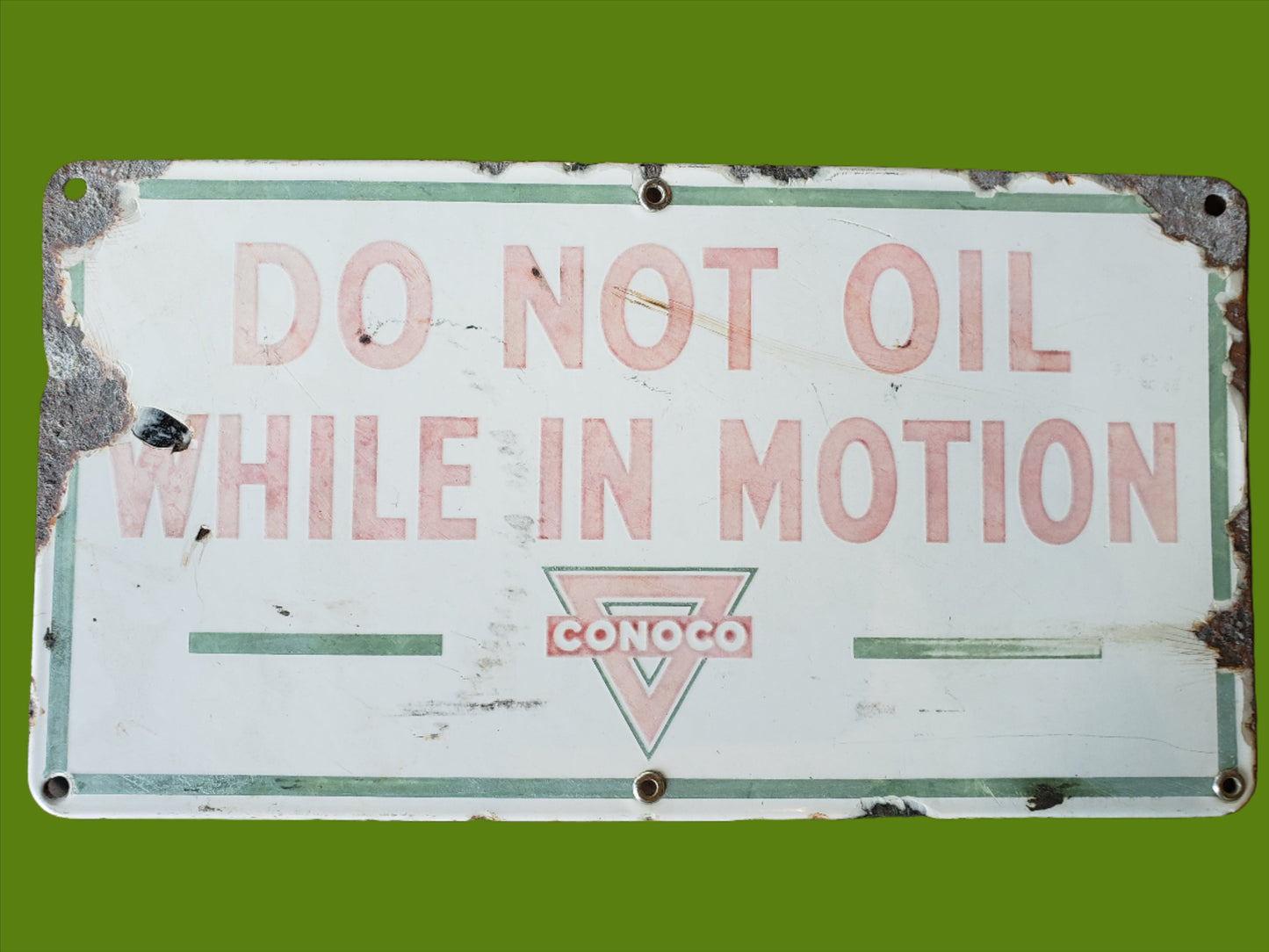 Conoco Do Not Oil While In Motion porcelain sign