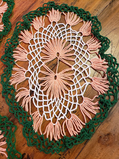 Set of three white, green and peach doilies