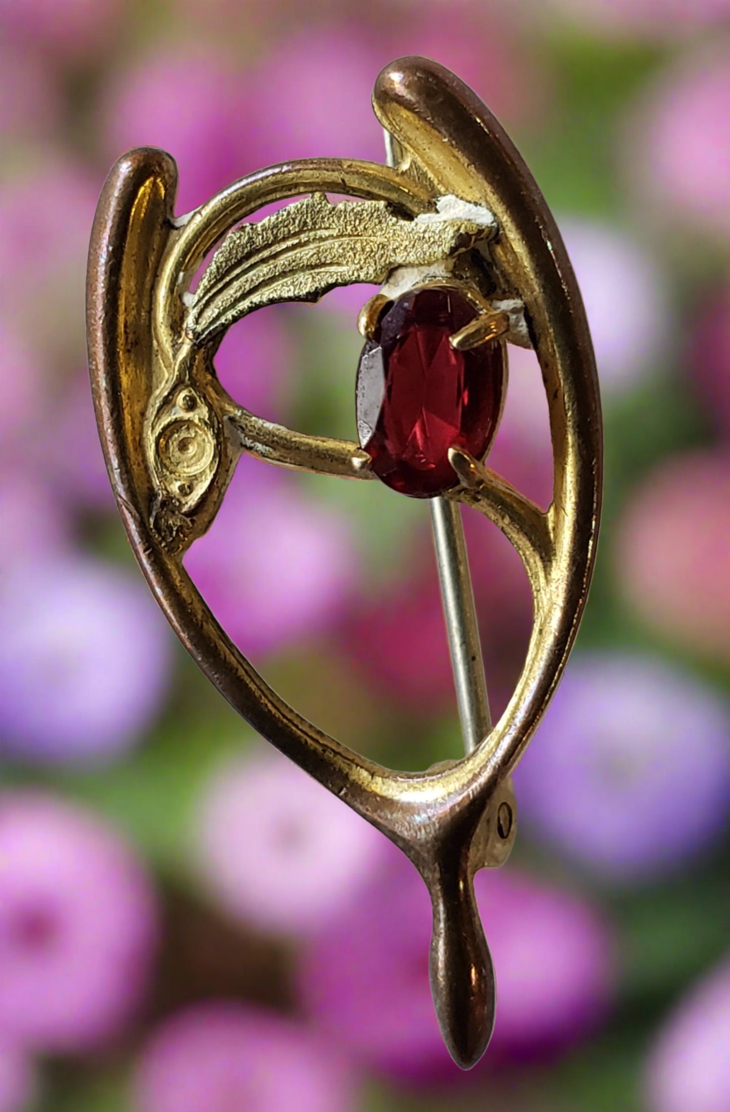 Wishbone pin with red gem