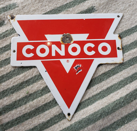Red and White Conoco gas pump plate