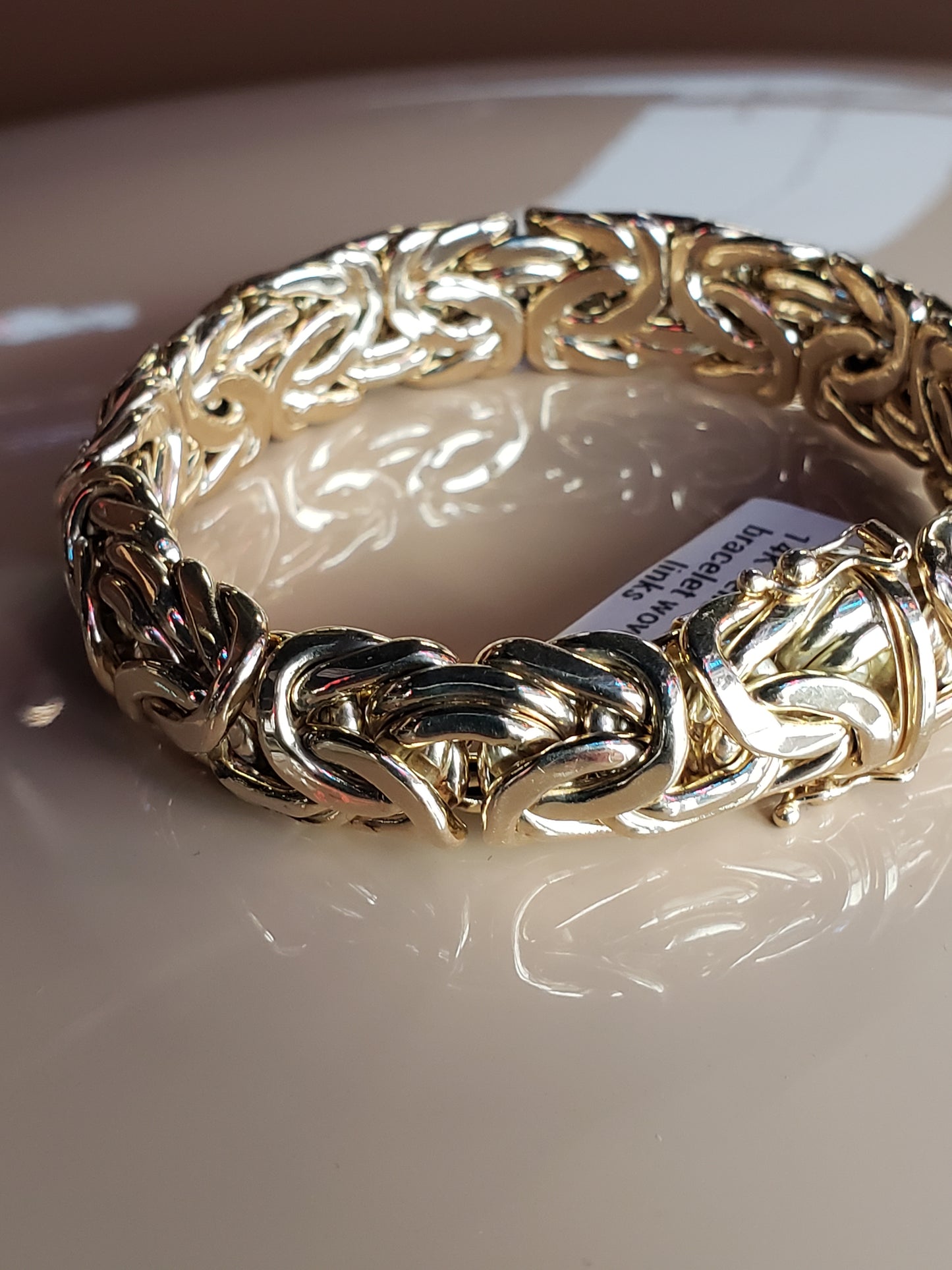 14K Yellow Gold bracelet with intricately woven links