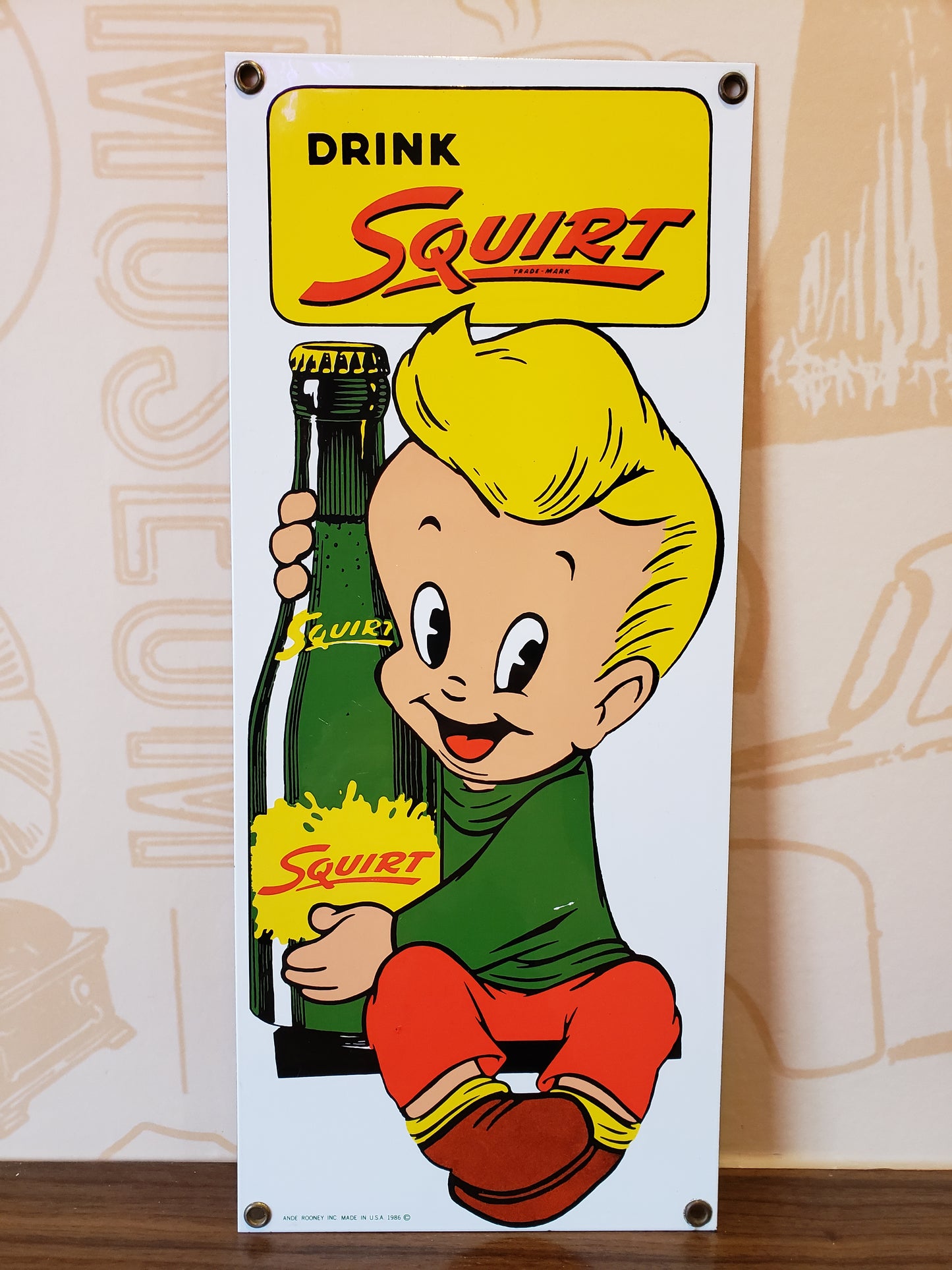 Ande Rooney Drink Squirt porcelain sign