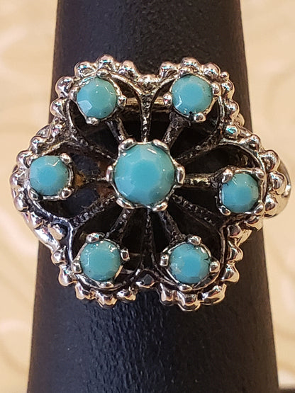 18K HGE ring 7 blue stones size 5.5