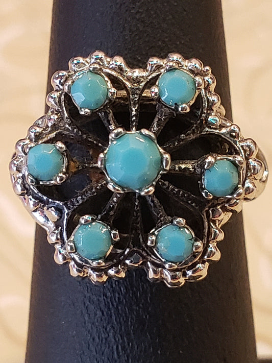 18K HGE ring 7 blue stones size 5.5