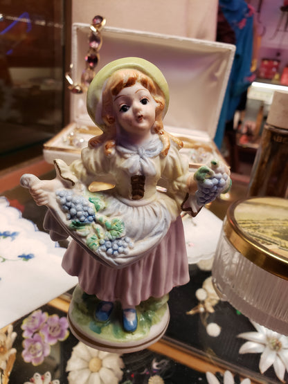 Girl with Grapes bisque figurine