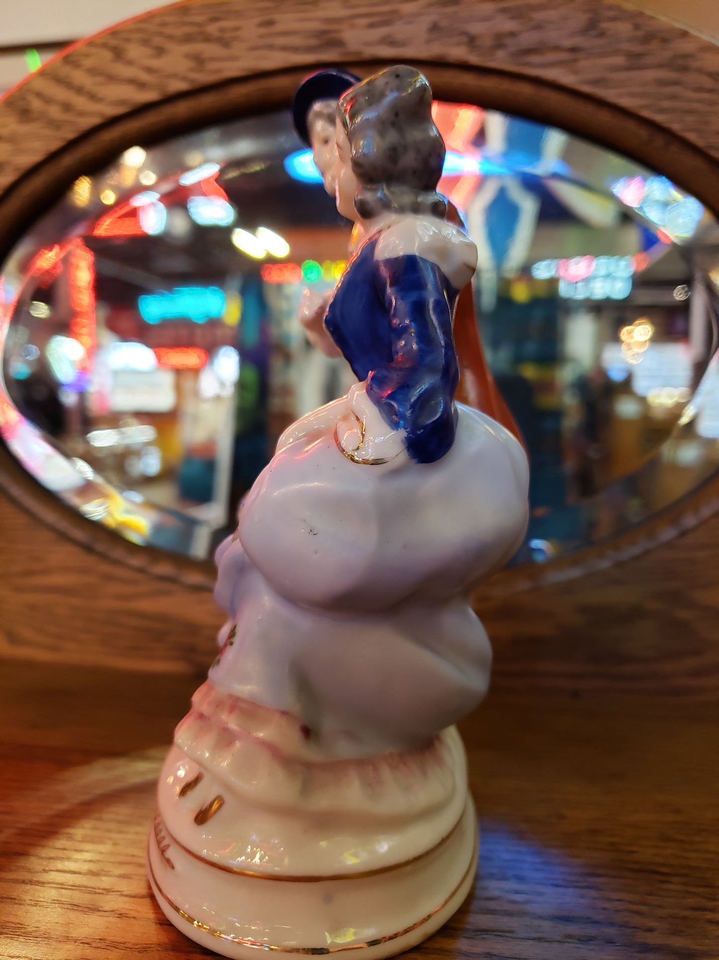 Porcelain figurine of Grey Haired Man & Woman