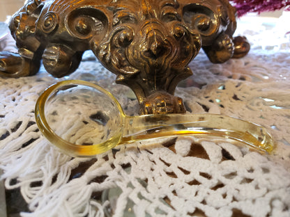 Vintage yellow glass spoon