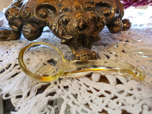 Vintage yellow glass spoon