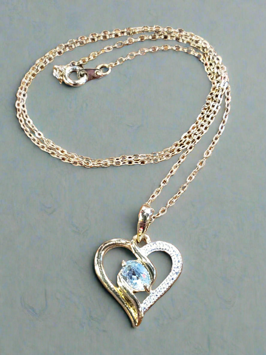 Heart necklace with blue stone