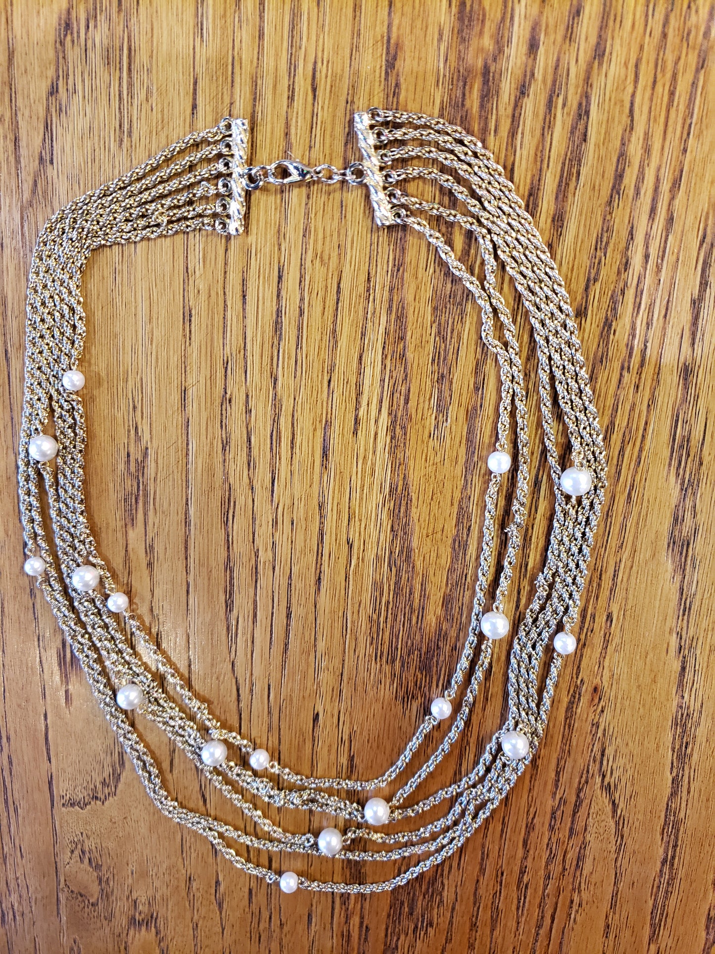 6 strand gold tone necklace white beads