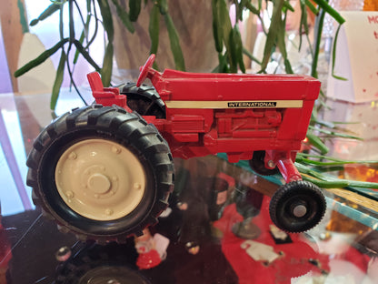 Red metal International tractor toy