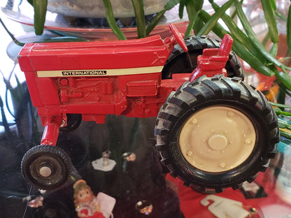 Red metal International tractor toy