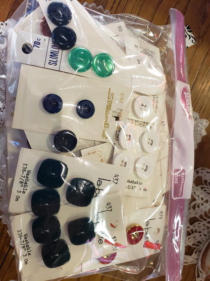 Bag of colorful buttons on cards