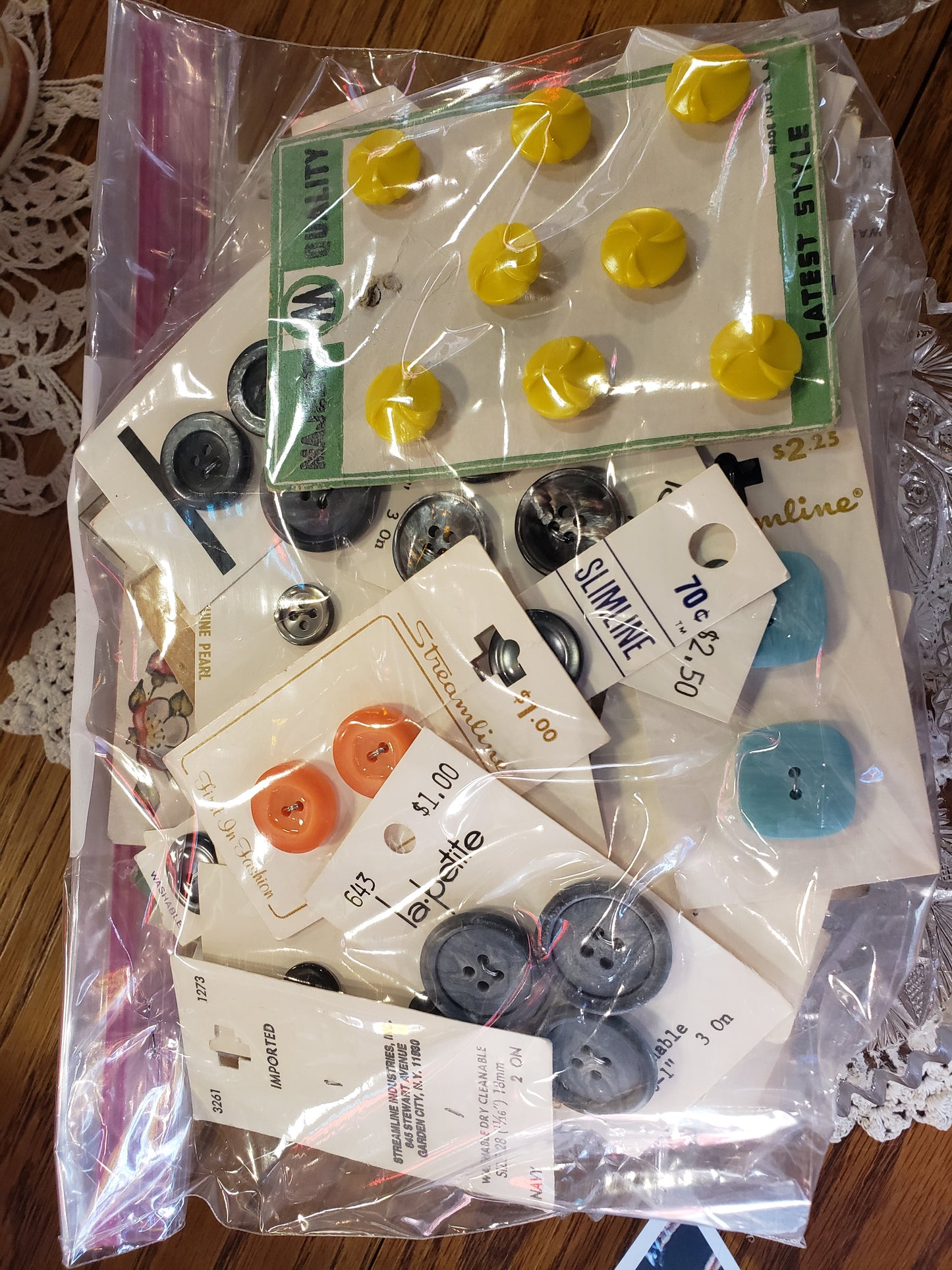 Bag of colorful buttons on cards