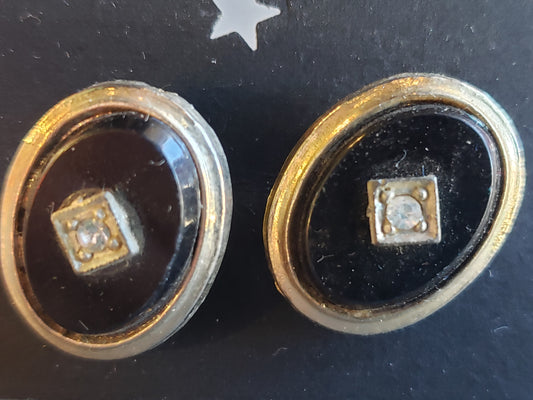 Black oval cuff links with rhinestones