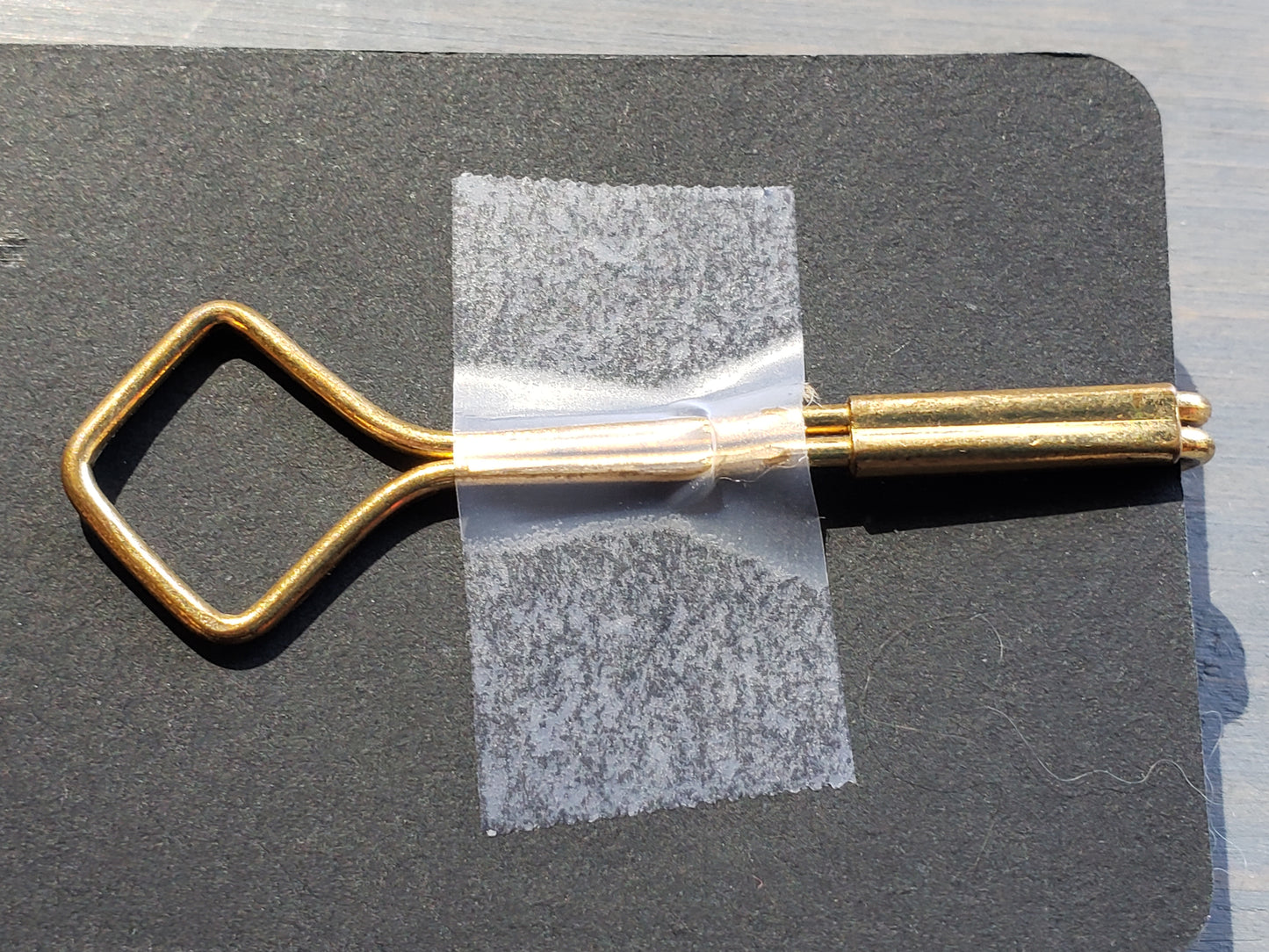 Brass and Green stone tie clip