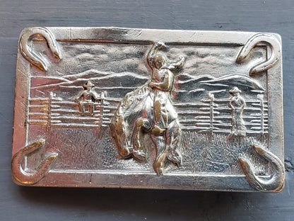 Vintage bucking horse and horse shoes belt buckle
