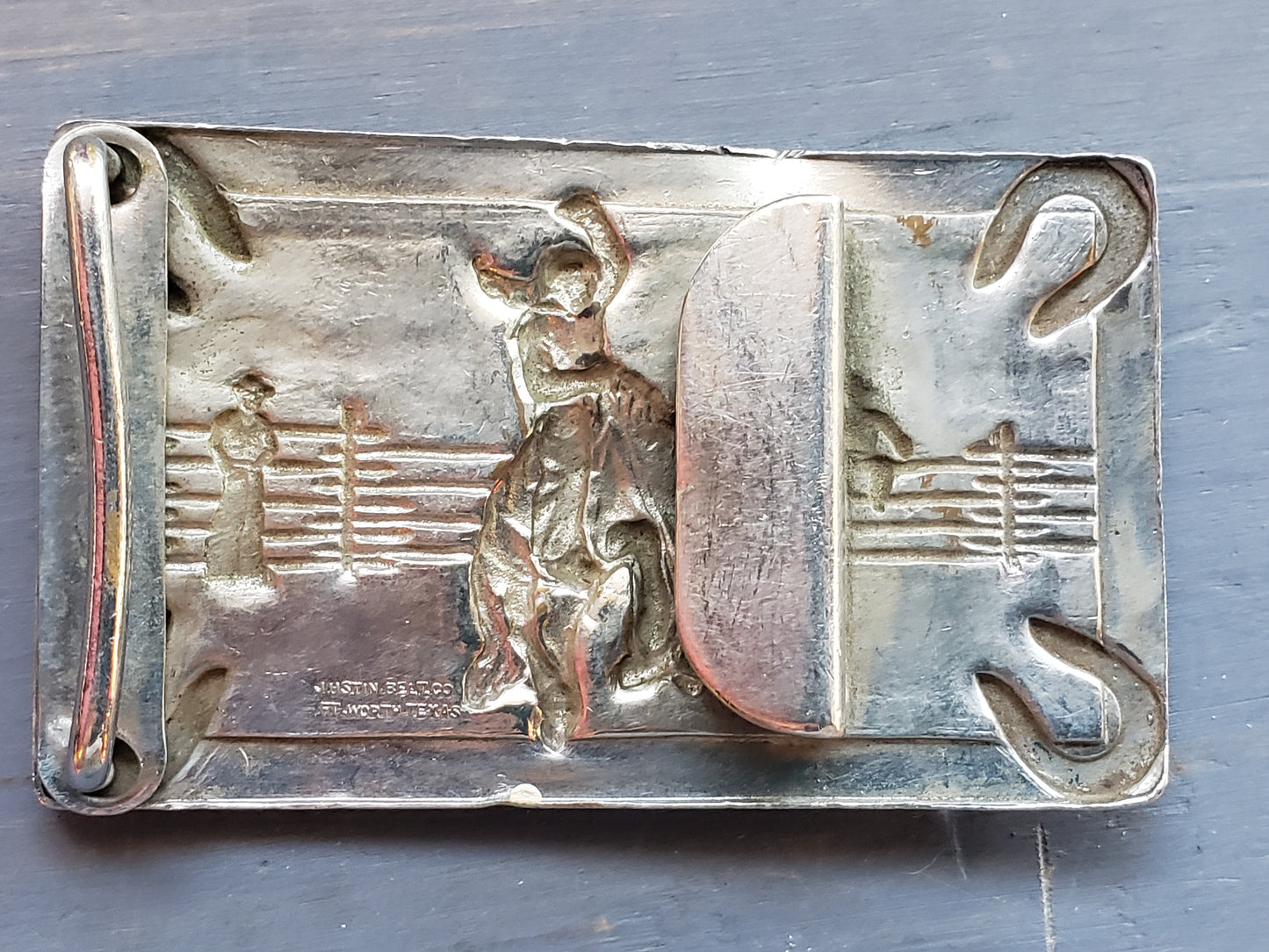 Vintage bucking horse and horse shoes belt buckle