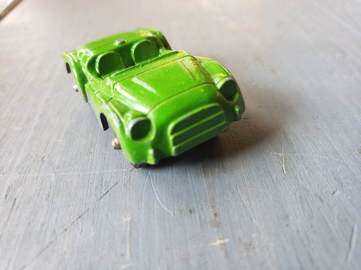 Green Austin Healey diecast car