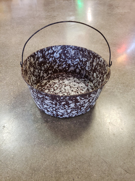 Brown White enamelware strainer with handle