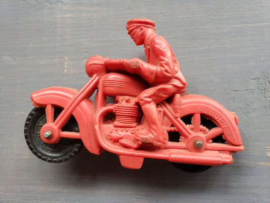 Auburn Red man on motorcycle
