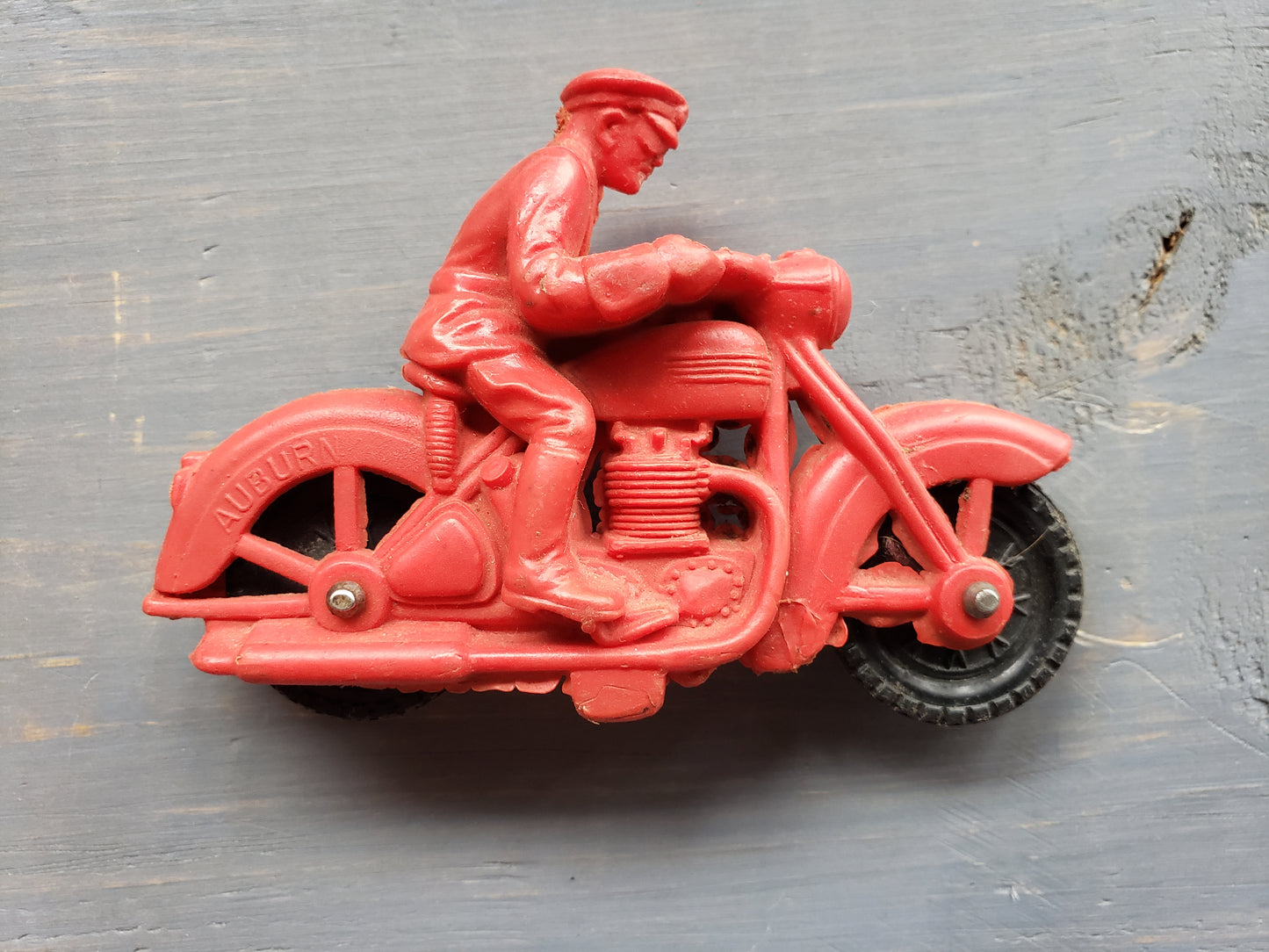 Auburn Red man on motorcycle